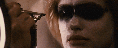 File:Pris painting her eyes.gif